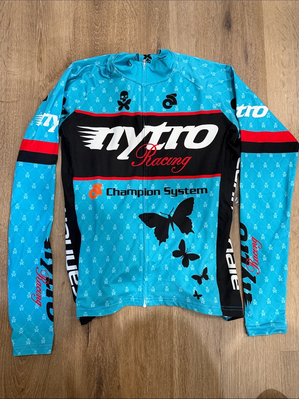 Nytro Racing Betty Designs Long-Sleeve Cycling Jacket Turquoise | Medium